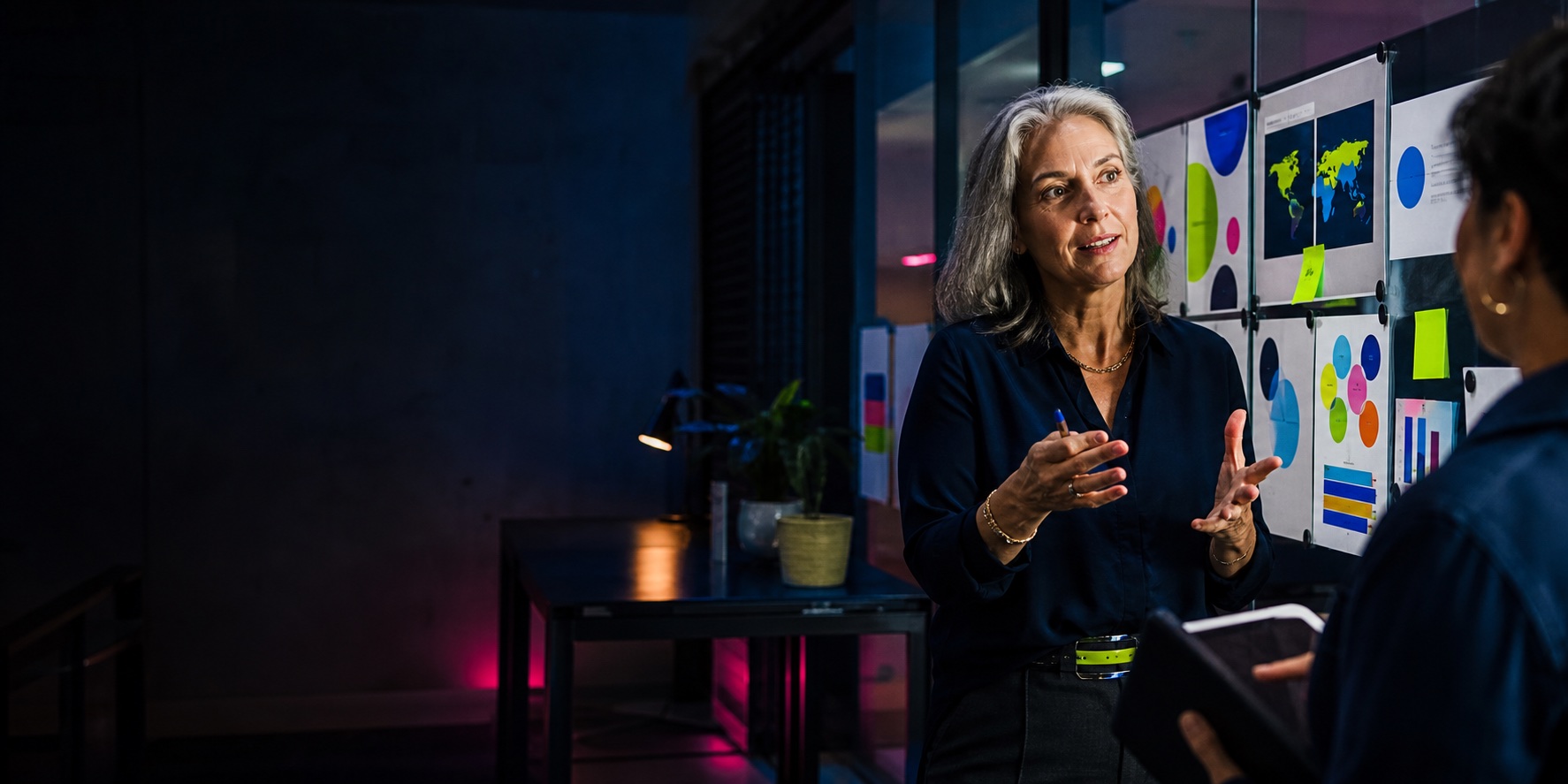 Business development leader presenting a partnership and growth strategy in a creative studio.